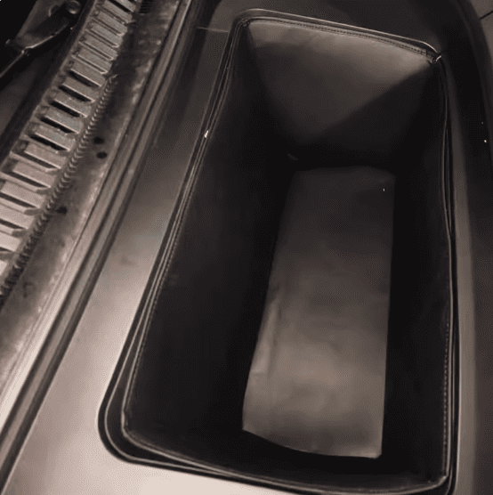Installed front trunk storage bin in BYD Sealion 7, showcasing fitted design and deep compartment