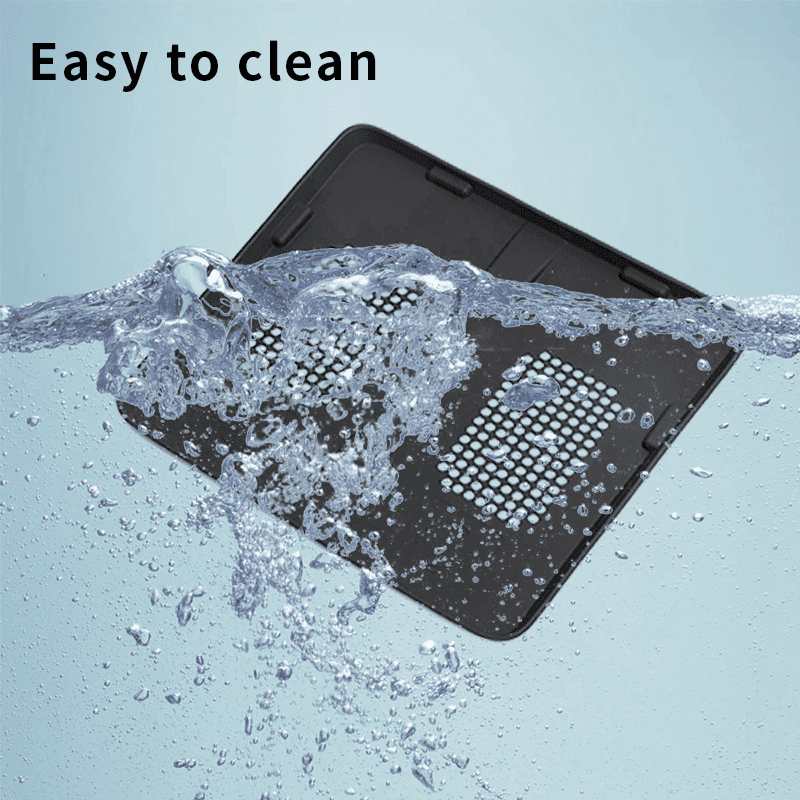 BYD Shark 6 wireless charging silicone pad being washed underwater, easy to clean and waterproof design
