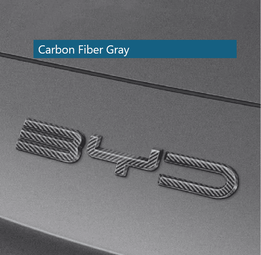 Carbon fiber gray 3D front emblem decal installed on BYD Sealion 6 bumper, offering a sporty and textured look