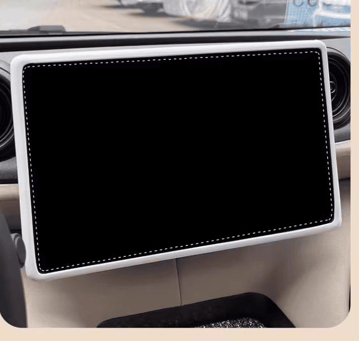 White silicone screen trim installed on BYD central display