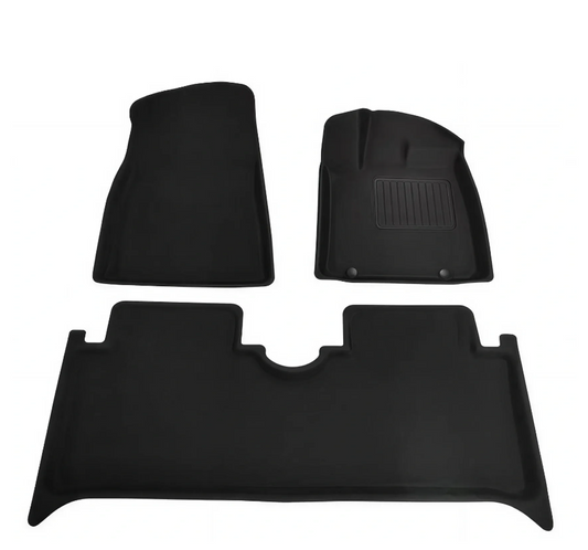 Front and rear XPE floor mats for BYD Dolphin showing precision moulded design and anti-slip surface texture.