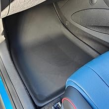 Rear left TPE floor mat installed in the BYD Dolphin, showing snug fit and water-resistant surface