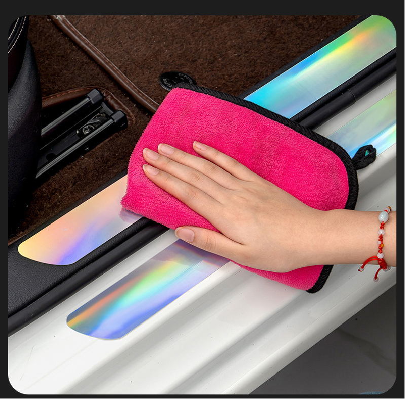 Demonstration of cleaning BYD iridescent door sill guard with microfiber cloth – easy to maintain surface