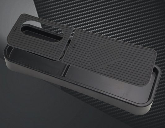BYD Seal custom-fit dashboard rear tray in durable black ABS, showing dual sliding covers and anti-slip texture for secure organization behind center screen