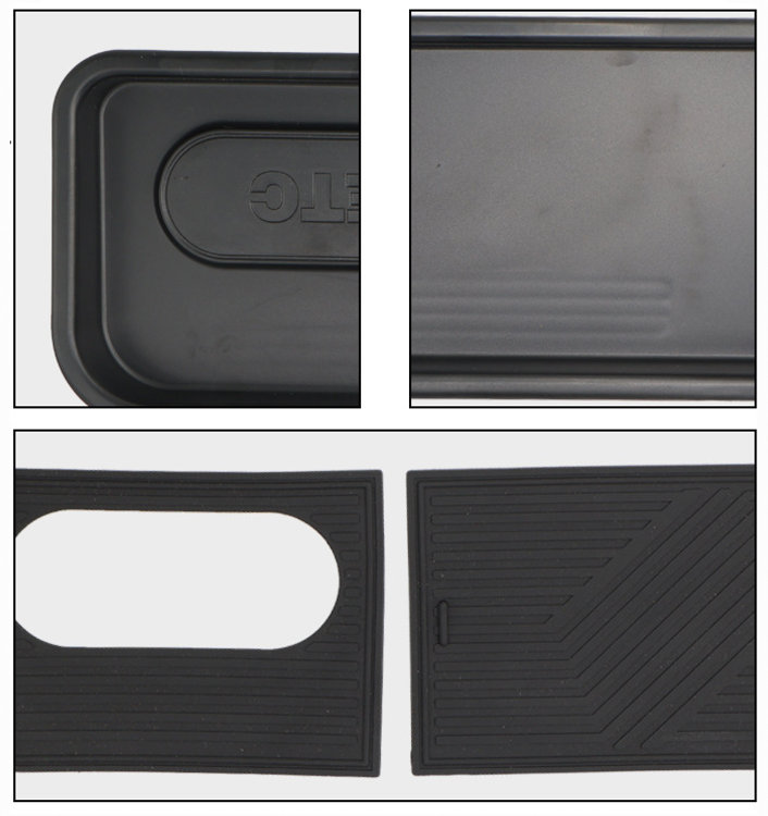 Detail view of BYD Seal dashboard rear storage tray parts, including removable sliding lids with textured patterns and ABS plastic anti-slip finish