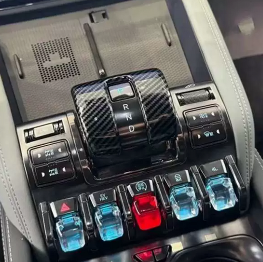 Close-up of carbon fiber gear shift trim cover on BYD Shark 6 center console