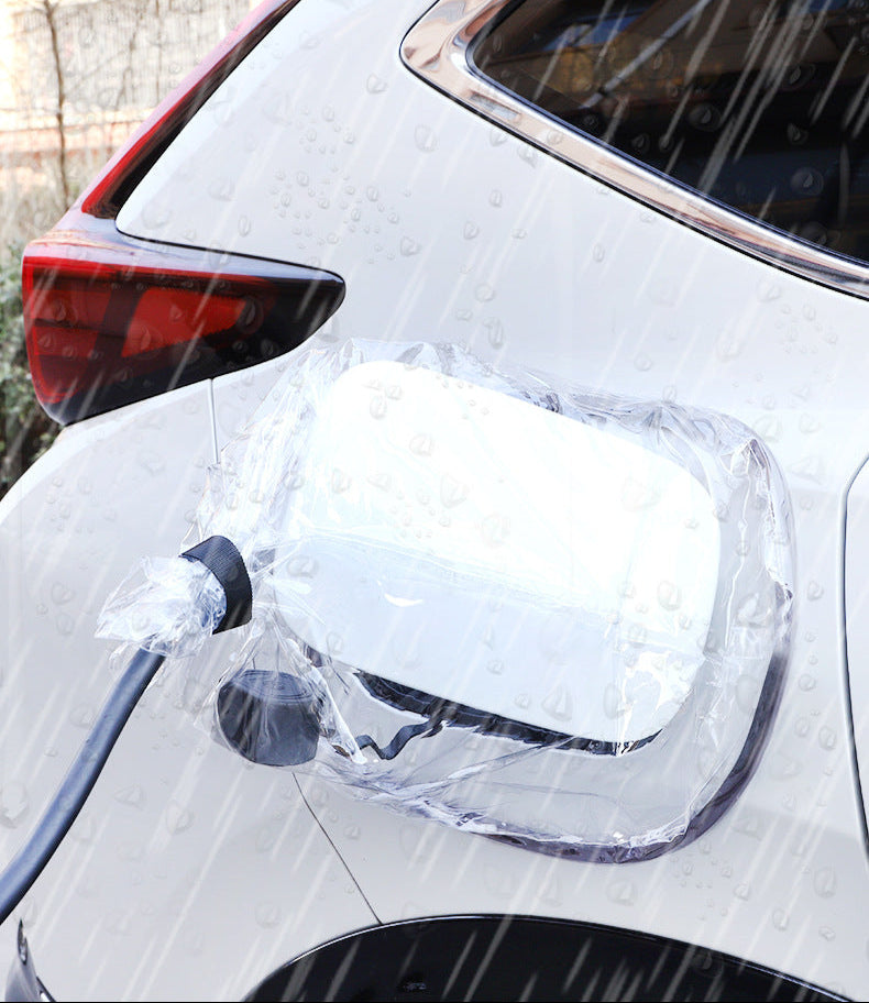 Waterproof EV charger cover in use during rainy weather on a BYD vehicle – protects charging port from moisture and short-circuit risks.