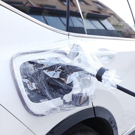 Transparent EV charging port cover protecting BYD vehicle’s charging area from rain and dust while keeping the design visible.