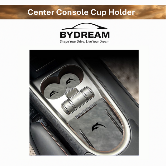 Close-up of BYD Dolphin center console showing custom-fit silicone cup holder mat with dolphin logo, waterproof and dustproof for clean car interior.