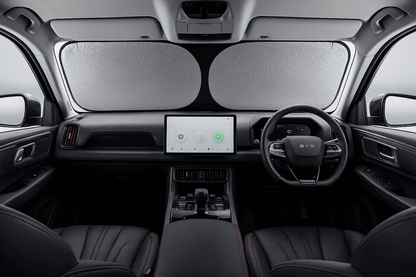 Full dashboard view of BYD Atto 3 with foldable windshield sunshade fully installed for UV and heat protection