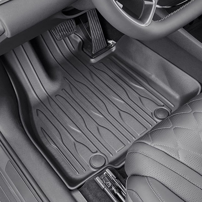 Driver side custom floor mat for BYD ATTO 1 with raised spill edges