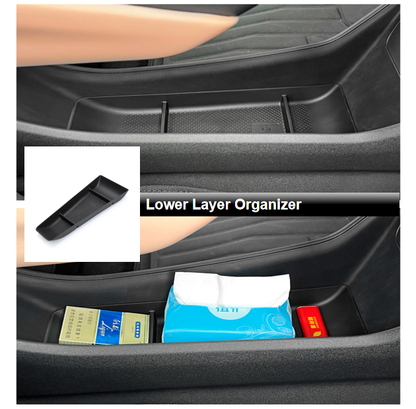 BYD ATTO 1 center console lower layer organizer showing storage compartments with daily items
