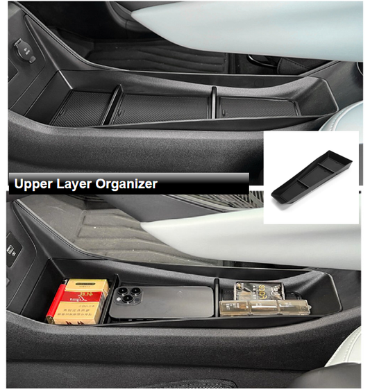 BYD ATTO 1 center console upper layer organizer showing storage compartments with daily i
