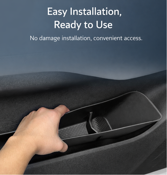 Hand installing a BYD ATTO 1 door pocket organizer insert into the lower door bin, tool-free drop-in fitment for interior storage organisation (Australia)