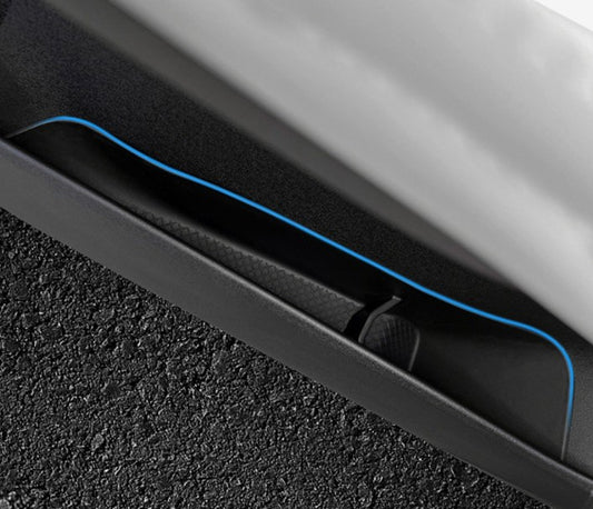 Close-up of BYD ATTO 1 lower door pocket with door pocket organizer insert fitted, showing divider tray storage for small items (Australia)