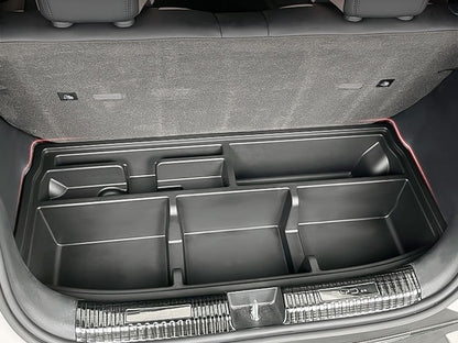 BYD ATTO 1 custom-fit trunk boot organizer tray in black ABS plastic with multiple compartments to separate tools, groceries and accessories; space-saving storage insert keeps the boot tidy and prevents items sliding (BYDREAM).