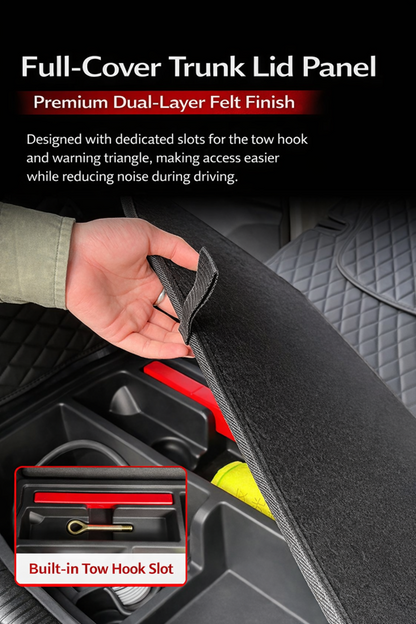 BYD ATTO 1 full-cover trunk lid panel with premium dual-layer felt finish, hand lifting the cover to show organized boot storage and a built-in tow hook slot for quieter, cleaner cargo space.