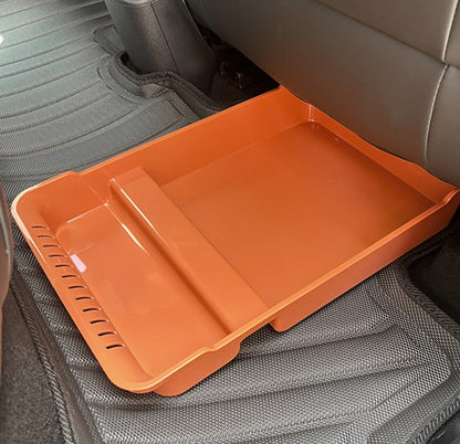 Orange under seat storage box installed under the rear seat of BYD ATTO 1, custom fit hidden seat gap organizer tray by BYDream