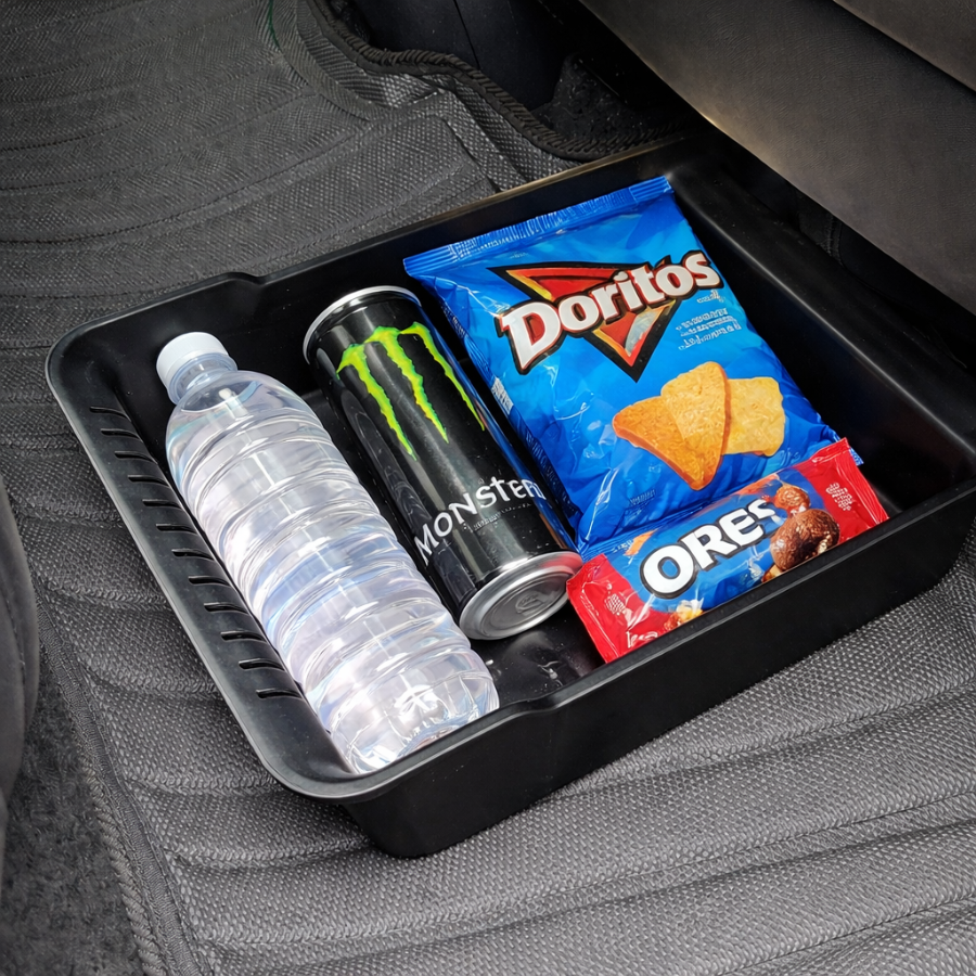 Under seat storage box for BYD ATTO 1 holding drinks and snacks, hidden rear seat organizer tray showing storage capacity, BYDream accessory