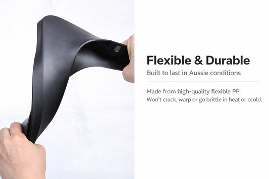 Hands bending a flexible PP mud flap for BYD ATTO 2 (2024–present), showing durable splash guards designed for Aussie conditions that resist cracking, warping and brittleness in heat or cold.