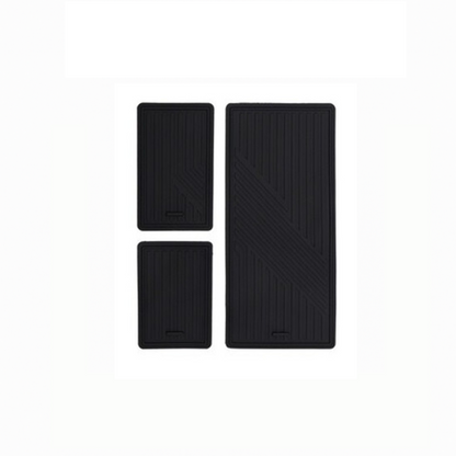 Three black non-slip rubber mats for BYD ATTO 3 center console organizer, displayed separately.
