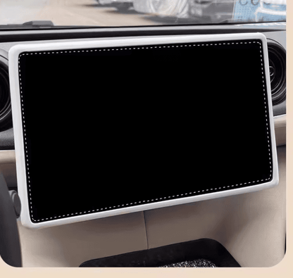 White silicone screen trim installed on BYD central display