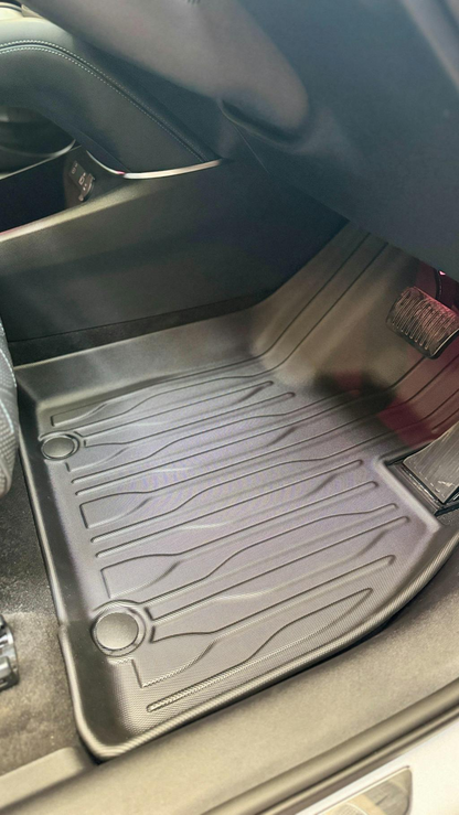Driver side floor mat installed in BYD Sealion 7 with raised edge protection