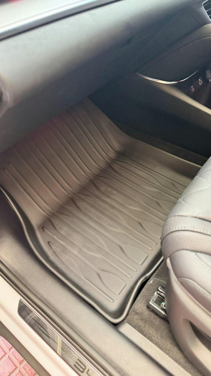 Front passenger floor mat installed in BYD Sealion 7 showing waterproof texture