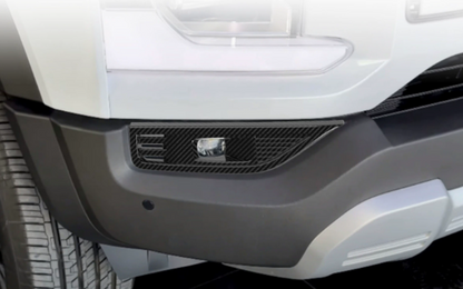 Carbon fiber style fog light trim cover installed on BYD Shark 6 front bumper