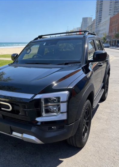 BYD Shark 6 pickup truck with roof rack cross bars installed