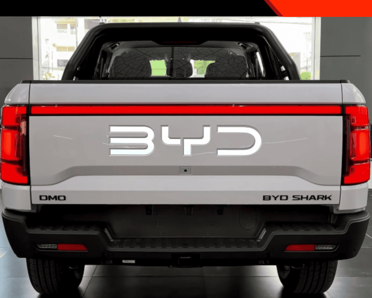 Chrome BYD emblem installed on the tailgate of BYD Shark pickup truck