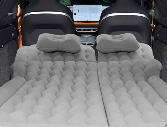 Grey inflatable car mattress for BYD models, fits rear seat for car camping, long trips, and emergency rest.