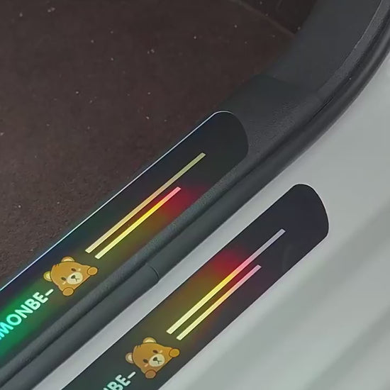 BYD car door sill sticker installation and finish demo – iridescent threshold guard with cartoon design
