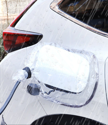Waterproof EV charger cover in use during rainy weather on a BYD vehicle – protects charging port from moisture and short-circuit risks.